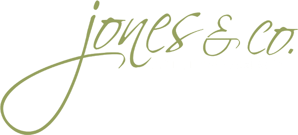 Jones & Co Artist Management logo text on a transparent background
